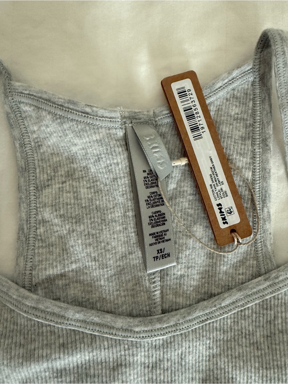 Two Skims brand new dresses, grey and black (same style), and a nude body suit